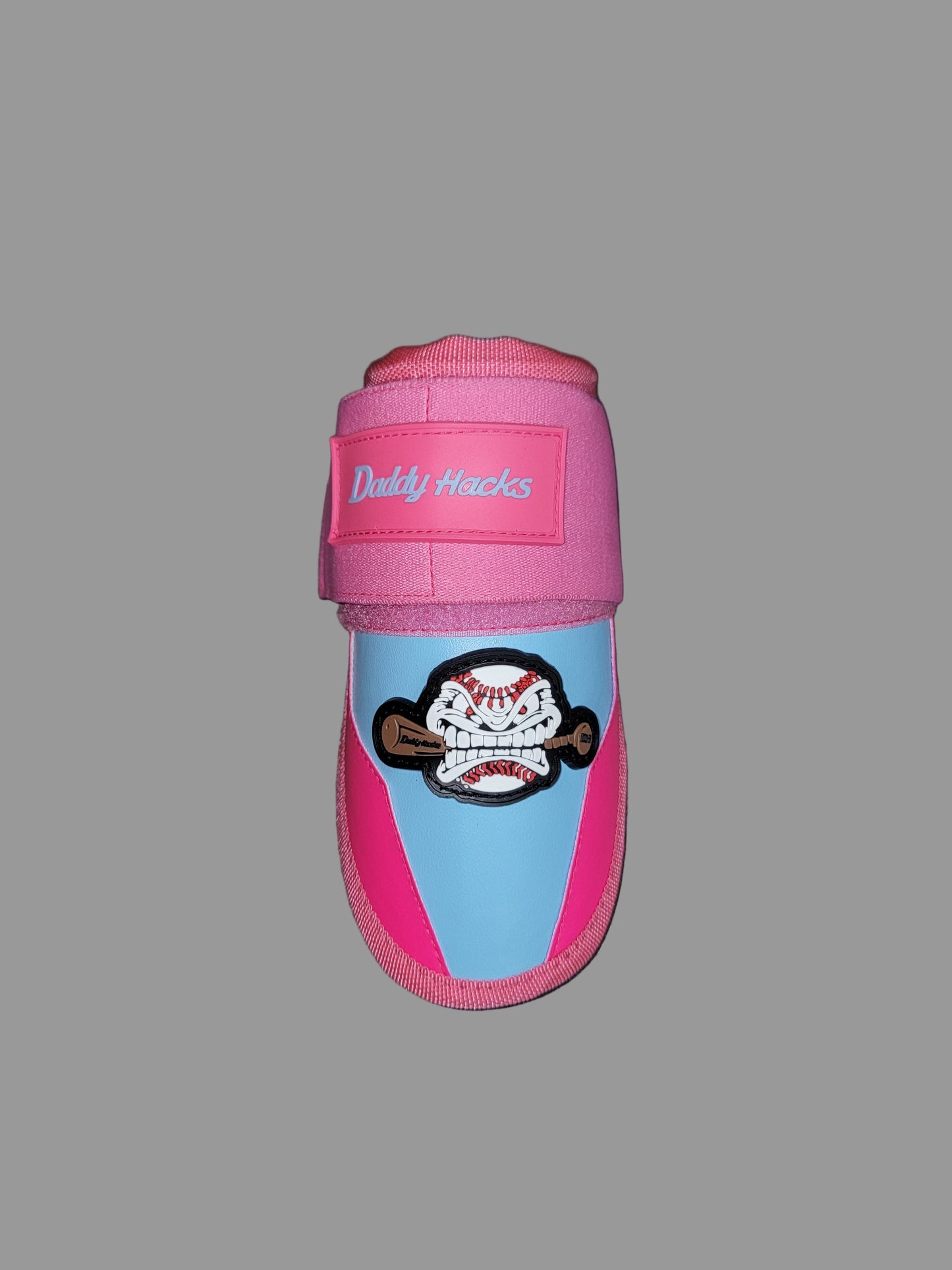 Pink and blue shoe with a logo on a gray background